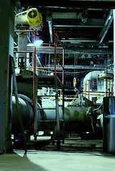 Image showing Pipes, tubes, machinery and steam turbine at a power plant