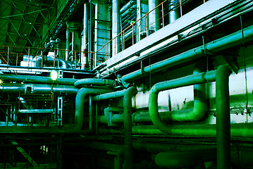 Image showing Pipes, tubes, machinery and steam turbine at a power plant