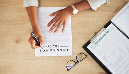 Image showing Legal form, hands and person with insurance policy and writing with document and paperwork at law firm. Attorney, claim and contract to sign at a company with top view and information with pen