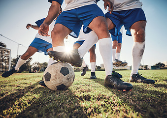 Image showing Training, soccer ball and men with action, closeup and health with workout goal, wellness and motion with sports. Male players, guys and athlete with a challenge, football and competition with energy