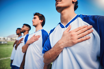 Image showing Football team, national anthem and listening at stadium before competition, game or match. Soccer, song and sports players together for pride, collaboration for contest or exercise with hands closeup