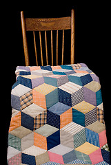 Image showing Antique Quilt And Kitchen Chair