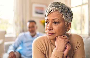 Image showing Divorce, senior woman and fight or sad in marriage in living room with partner or angry in home. Problem, upset and female person with conflict on sofa with couple or breakup and frustrated together.