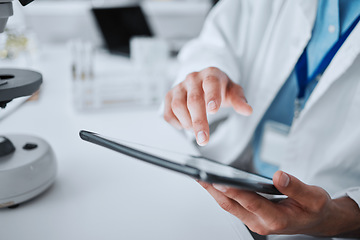 Image showing Hospital, doctor and hands with tablet for research, medical innovation and working. Clinic, typing and chemistry analysis with professional and lab worker with tech for laboratory science and data