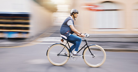 Image showing Student man, bike and city in motion blur, speed and sustainable travel in street for fitness in summer. Young guy, retro bicycle and fast with eco friendly transport in metro, road or outdoor in cbd