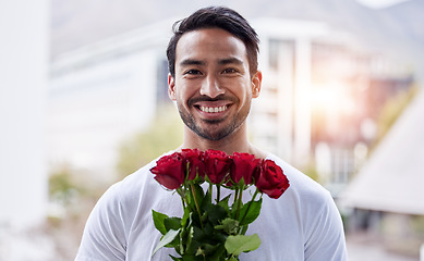 Image showing Smile, portrait and happy man with bouquet of roses for date, romance and hope for valentines day. Love confession, romantic gift and person holding flowers outside in city for proposal or engagement