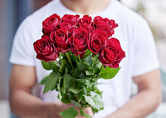 Image showing Love, romance and man with bouquet of roses for date, care for valentines day and gratitude. Romantic surprise, floral gift and person giving red flowers standing outside for proposal or engagement