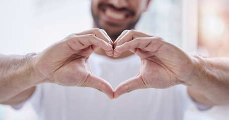 Image showing Closeup, hands and man with heart sign, support and review with romance, care and social media. Emoji, male person and guy with symbol for love, health and romantic shape with feedback and affection