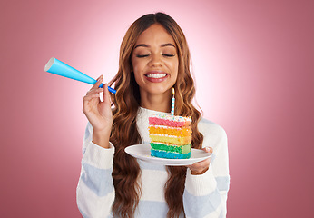 Image showing Woman, birthday and rainbow cake in studio with smile, excited face and happiness by gradient background. Happy model, girl and dessert with celebration, event or achievement at party by backdrop