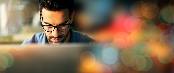 Image showing Computer, working and man with digital overlay or bokeh for information technology, software development and coding. Geek, person or worker on desktop pc for code, developer strategy and programming