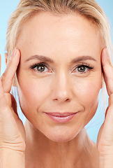 Image showing Portrait, senior woman and skincare with dermatology, cosmetics and against blue studio background. Face detox, mature female and lady with organic facial, salon treatment and grooming on backdrop