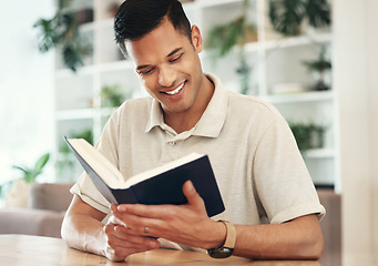 Image showing Young man reading bible for religion, faith and god knowledge, studying or research at home. Faith, hope and christian person with holy book for learning, analysis and spiritual wellness or scripture