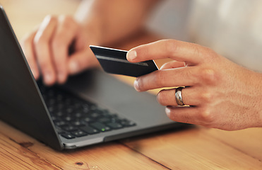 Image showing Payment, credit card and hands with a laptop for online shopping, banking and finance. Ecommerce, retail and person typing debit information into a pc for a convenient electronic purchase on the web