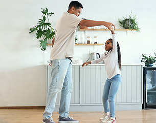 Image showing Dance, playful and father and daughter bonding, teaching a move and enjoying quality time. Love, help and dad dancing with a girl daughter, playing and being crazy with happiness in the kitchen