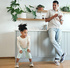 Image showing Dance, happy and father with child bonding, playing and laughing together in the morning. Comic, funny and carefree girl dancing with her dad for happiness, comedy and freedom in a home kitchen