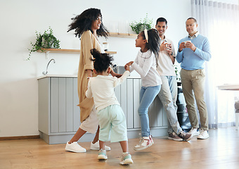 Image showing Happy, dance and jump with big family in kitchen for bonding, weekend and celebration fun. Wellness, music and playing with children and mother for dancing for happiness, affection and holiday