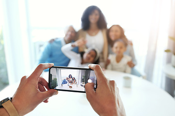 Image showing Smartphone photography, screen and hands with family at home, taking picture and memory with love and care. Technology, closeup and people together with focus, lens and photographer, app and phone
