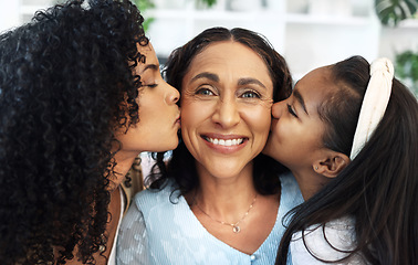 Image showing Portrait, kiss on the cheek for a senior woman with her daughter and granddaughter in their home together. Face, love or family with a mother, adult child and girl bonding in a house on mothers day