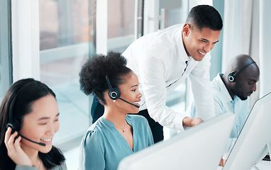 Image showing Training, help and people in telemarketing at a call center, online consulting and support. Contact us, advice and a manager helping customer service workers with digital client communication