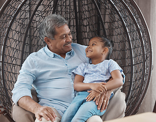 Image showing Grandparent, girl and smile with love, support and care of senior man and child at home. Living room, retirement and elderly grandfather with kid and happiness together in a house feeling relax
