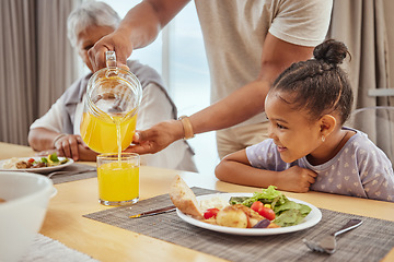 Image showing Fruit juice, family dinner and girl with father and orange drink at table with lunch food. Dad, children and senior people together with love, care and parent support ready for eating with a smile