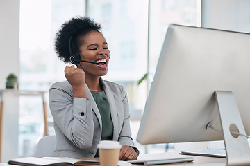 Image showing Black woman, call center and celebration for winning, promotion or sale in telemarketing at the office desk. Happy African female consultant or agent celebrating win, bonus or victory by computer