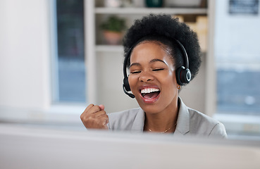 Image showing Black woman, call center and celebration for winning, sale or promotion in telemarketing at the office desk. Happy African female consultant or agent celebrating win, bonus or victory by computer