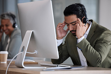 Image showing Telemarketing, headache and man with stress, call center and burnout in office, overworked and fatigue. Male employee, consultant and agent for customer service, tech support and anxiety in workplace