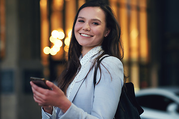 Image showing Phone, walking and portrait of a business woman in the city networking on social media or mobile app. Happy, smile and professional female employee browsing the internet in town commuting to work.