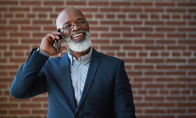 Image showing Phone call of senior black man on brick wall for business communication, networking success or news. Happy professional manager, USA executive or boss talking on smartphone for investment opportunity