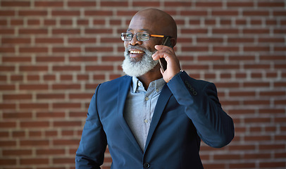 Image showing Phone call of business black man on brick wall for communication, networking success or news. Happy professional manager, senior executive or boss talking on smartphone for investment opportunity