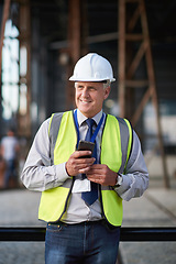 Image showing Construction, engineer and man with phone thinking outdoor about building project management. Contractor person and smartphone for civil engineering, safety and development at site for vision or idea