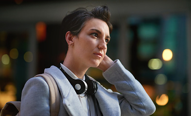 Image showing Business woman outdoor thinking, face and travel to work with headphones, mockup with bokeh and commute in city. Young creative, mindset and vision with web designer, career and growth in London
