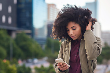 Image showing Black woman, phone and city with a young person with mobile connection outdoor. Social media, networking and digital scroll of a African female with mockup and blurred background reading a text