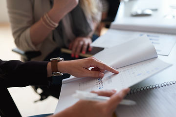 Image showing Finance, stats and hands of a business person with a report in a meeting for investment and growth. Teamwork, data and employees reading a financial document with data, graph and economy analysis