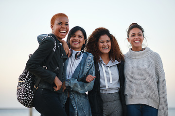 Image showing Bonding, laughing and portrait of women at the beach for travel, quality time and a reunion. Smile, laughing and diversity with friends on a group vacation by the sea to relax together in Miami