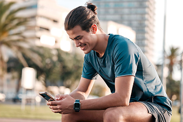 Image showing Phone, fitness and man in city for workout, exercise and internet search on social media for health tips. Urban sports guy with smartphone, mobile typing and check wellness goals on digital tech app