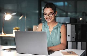 Image showing Office laptop, night and black woman reading finance portfolio feedback, stock market database or ecommerce. Forex investment budget, web data analysis and happy trader trading NFT, bitcoin or crypto