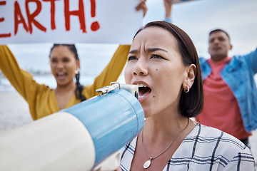 Image showing Asian woman, climate change and megaphone protest with crowd protesting for environment and global warming. Save the earth, activism and angry female shouting on bullhorn to stop beach pollution.