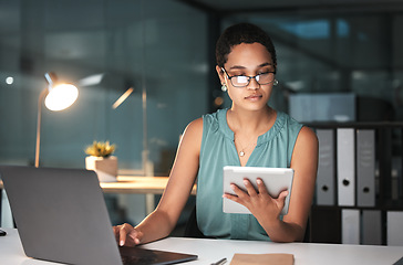 Image showing Tablet, laptop and business woman reading finance portfolio feedback, stock market database or African ecommerce. Forex investment budget, data analysis or night trader trading NFT, bitcoin or crypto