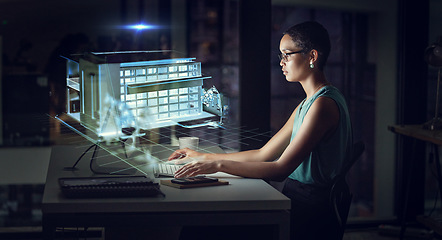 Image showing Hologram, computer and business woman typing in office with 3d building at night. Futuristic, ai and female employee with holographic software for architecture, home or house with augmented reality.