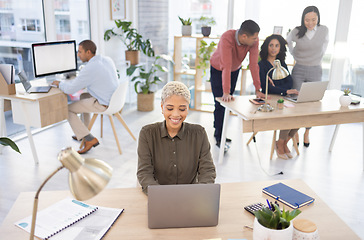 Image showing Office, startup and black woman typing on laptop in coworking, workspace management and workflow planning. People, employees or business staff working together and teamwork for online career strategy