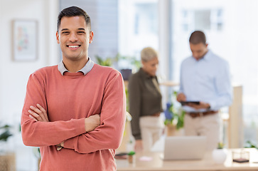 Image showing Portrait, mockup and businessman or employee happy with startup company in a modern office arms crossed with smile. Person, confident and excited young male intern or worker at the workplace