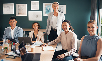 Image showing Portrait, group of business people at desk with smile and confidence at meeting for employees in office. Teamwork, about us and leadership, senior lawyer with happy legal team at advisory law firm.