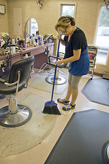 Image showing Hairdresser Sweeping