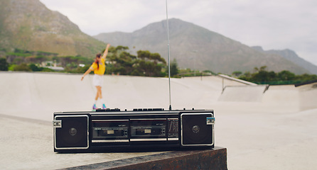 Image showing Music, park and woman rollerskating while dancing for fitness, training and learning in Norway. Freedom, practice and girl skating for exercise with a radio for motivation, fun and skate cardio