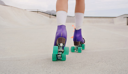 Image showing Freedom, skating and roller skates with shoes of woman outdoor park for training, hobby and health. Summer, sports and speed with girl skater and challenge course with cones for exercise or workout