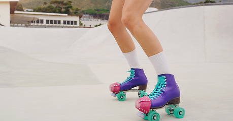 Image showing Boots, legs and woman on roller skate for fitness, training and sport on the ground. Exercise, park and feet of a girl doing cardio, learning to skate for urban sports and practice an activity