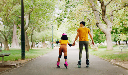 Image showing Mother, roller skates and child learning to skate at nature park for exercise, balance and freedom. Woman and black girl kid family outdoor skating for safety, trust and love for summer quality time
