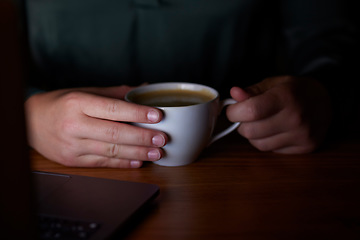 Image showing Energy, night and hands with coffee at work for business, deadline and working a late shift. Drink, project and person at an office with a latte, warm beverage or drinking tea while doing overtime